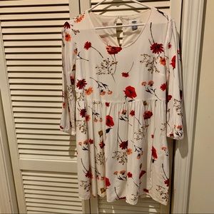 White babydoll dress with floral pattern